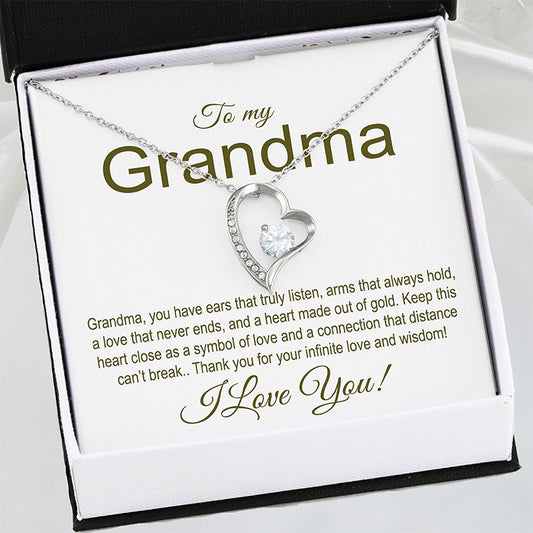 Heart-shaped necklace in a gift box with a message for a grandma
