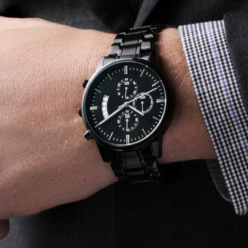 elegant men wearing a black wrist watch that features seconds stopwatch, minutes stopwatch, calendar and date display.