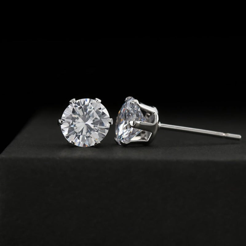 14K white gold finish cubic zirconia stud earrings.