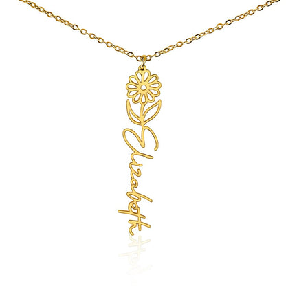 Gold custom birth flower name necklace with April birth flower daisy pendant and custom 'Elizabeth' engraving on a white background
