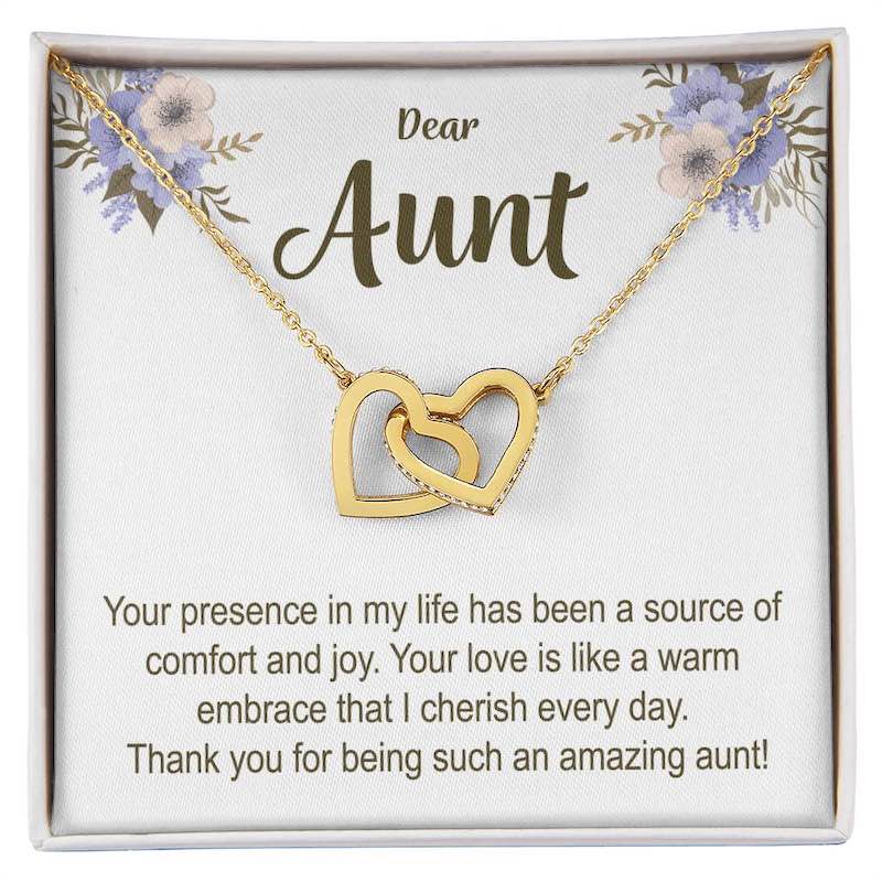 Gold necklace with interlocking hearts on a card for an aunt, featuring floral designs and personalized text.