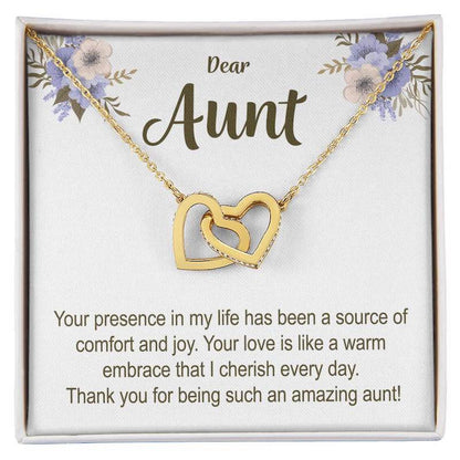 Gold necklace with interlocking hearts on a card for an aunt, featuring floral designs and personalized text.