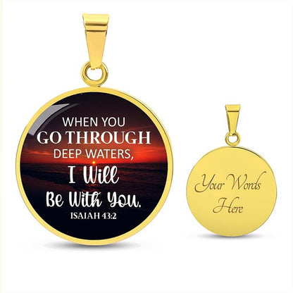 Gold pendant with Isaiah 43:2 quote and customizable message option on a white background