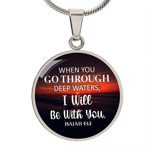 Necklace with pendant featuring a sunset design and bible verse