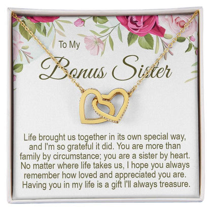 Personalised sister gift necklace: To My Bonus Sister gold interlocking heart necklace in a gift box with a floral message card.   
