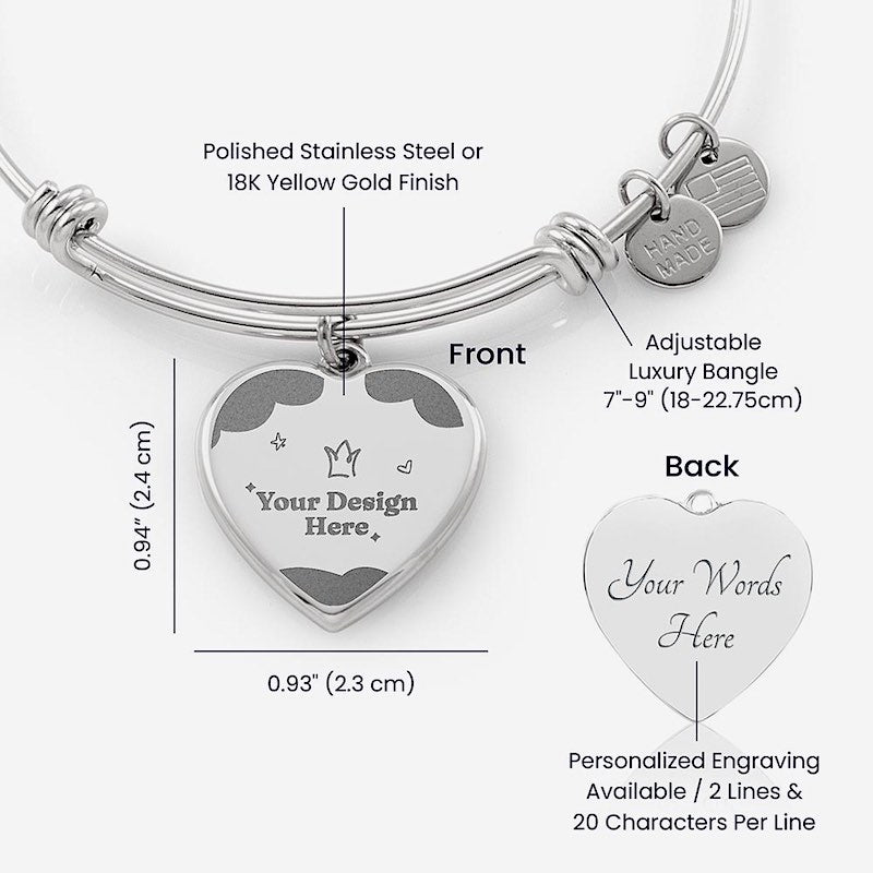 Silver adjustable bangle with heart-shaped engraving plate on a white background
