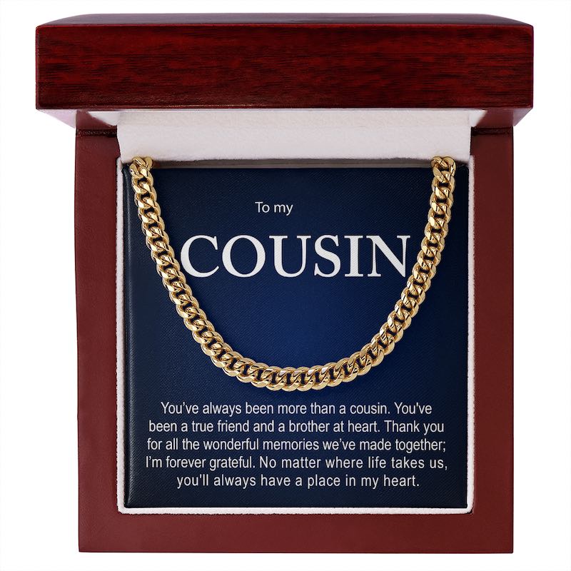 Men's gold Cuban link chain necklace set inside a mahogany wooden gift box featuring a navy blue card titled "To my COUSIN".   