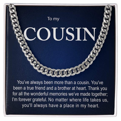 Silver Cuban link chain necklace displayed inside a white gift box against a dark blue card with a sentimental message titled "To my COUSIN".