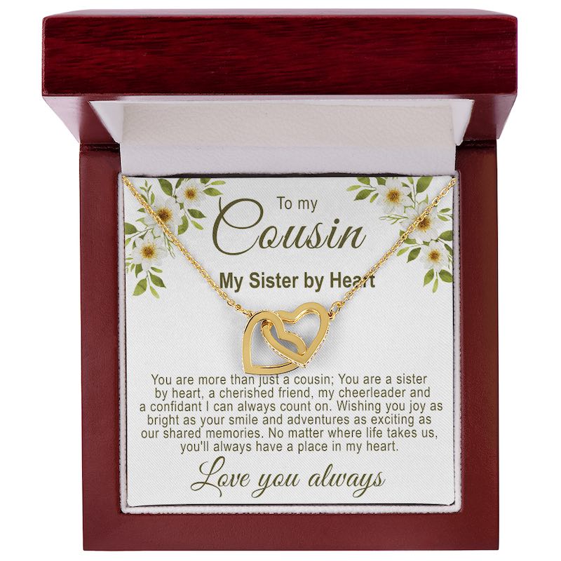 Personalized cousin gifts: Interlocking gold hearts necklace in a luxury mahogany-style gift box with a white floral cousin message card