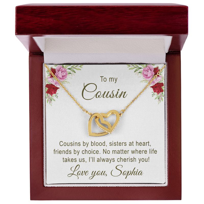 Gold necklace with interlocking hearts in a luxury box with a personalized message 'to my cousin' customizable with signature.