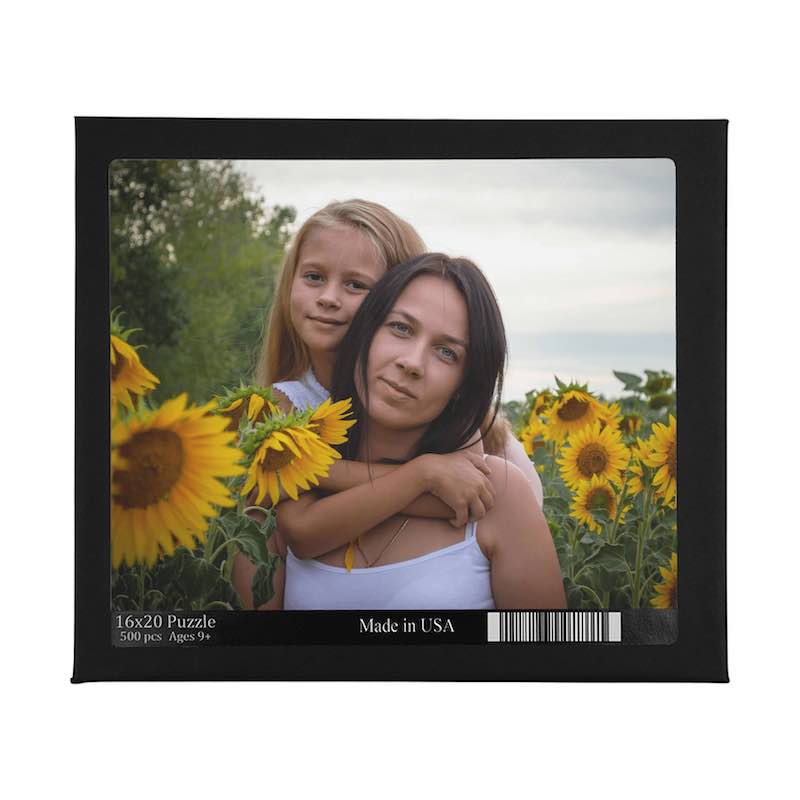 Black box for a 16x20 custom photo puzzle featuring a woman and young girl hugging in a sunflower field.