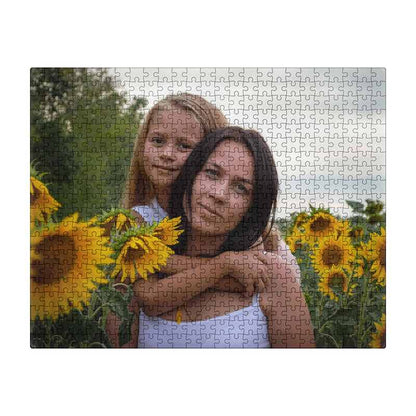 Custom photo jigsaw puzzle featuring a woman and a young girl hugging in a vibrant sunflower field.