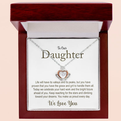 daughter graduation message: necklace with crown heart design in a wooden box with a message card for daughter.