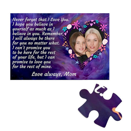 Custom rectangular jigsaw puzzle featuring a purple galaxy background, a photo of a mother and daughter framed inside a floral heart, a heartfelt message from Mom on the left, and a single loose puzzle piece below.