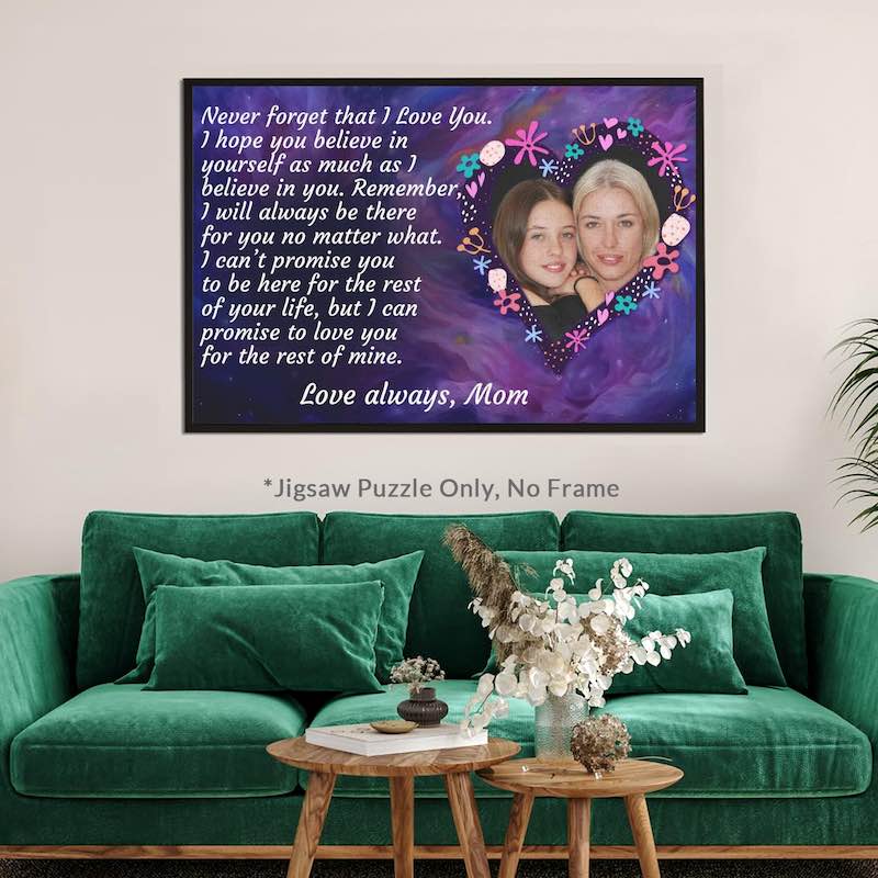 Completed custom mother-to-daughter photo jigsaw puzzle framed and displayed on a wall above a green velvet sofa, labeled "*Jigsaw Puzzle Only, No Frame".   