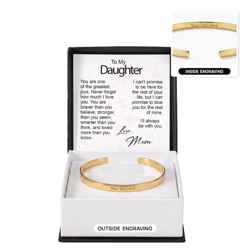 Gold engraved cuff bracelet in an open gift box with a "To My Daughter" message card from Mom, showing outer engraving on the main bracelet and an inset graphic labeled "Inside Engraving."