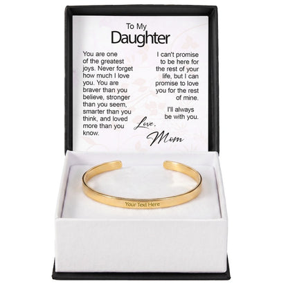 Gold custom-engraved cuff bracelet with "Your Text Here" sample engraving, displayed in a gift box with a "To My Daughter" sentiment card.