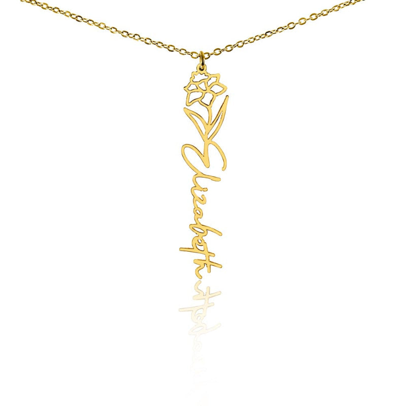 Gold flower birth name necklace with December birth flower narcissus pendant and custom 'Elizabeth' engraving on a white background
