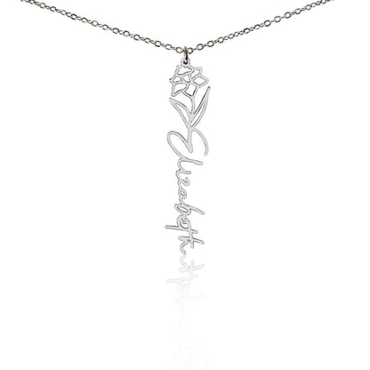 Personalized name necklace with December birth flower Narcissus pendant and custom 'Elizabeth' engraving on a white background
