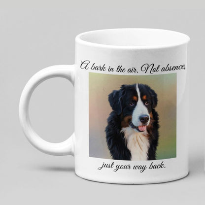 White mug with a Bernese Mountain dog picture and text on a gray background