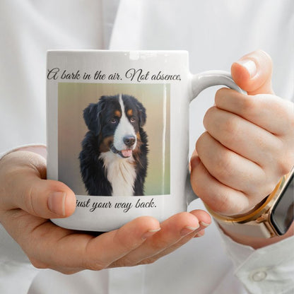 Person holding a mug with a dog photo and text