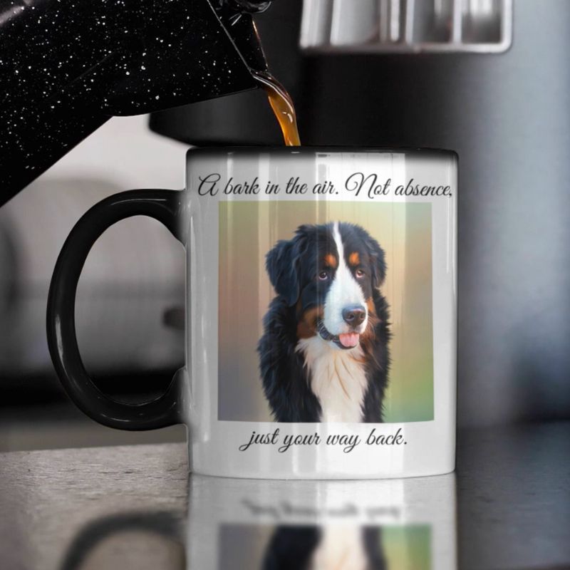 Mug with a dog photo and text, being filled with coffee.