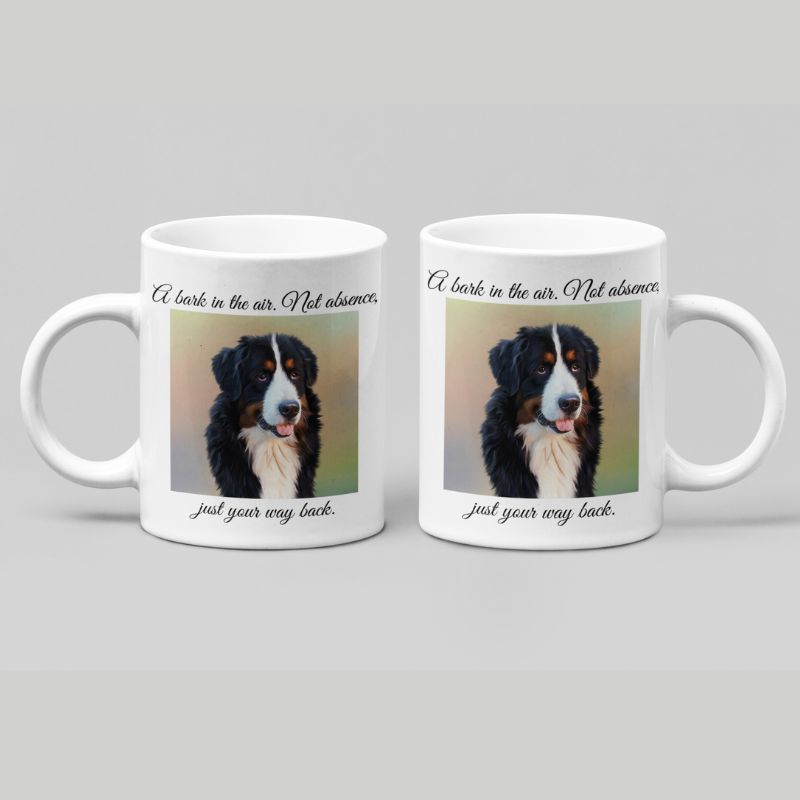 Two white mugs with a Bernese Mountain Dog illustration and text on a gray background