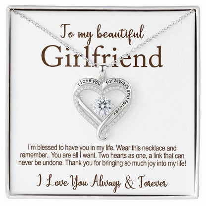 Gifts for Girlfriend: Heart-shaped necklace with a message card for a girlfriend on a white background