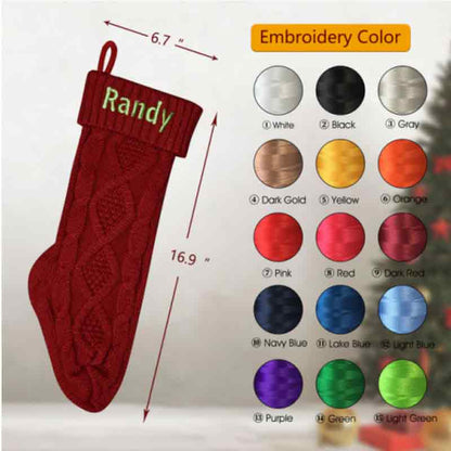 A red cable-knit Christmas stocking with the name 'Randy' embroidered in green on the cuff, shown with dimension arrows indicating 6.7 inches by 16.