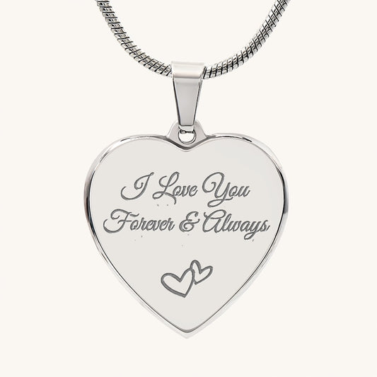 Silver heart-shaped pendant with 'I Love You Forever & Always' engraving on a white background