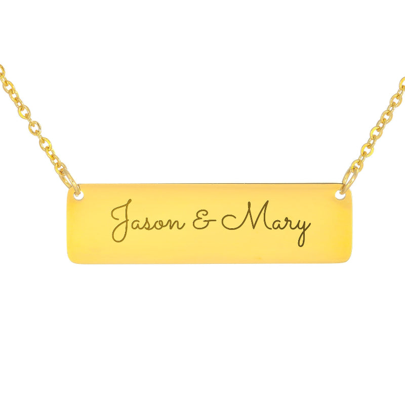 A gold rectangular bar necklace engraved with the names 'Jason & Mary' in cursive script, suspended from a gold chain against a plain white background.