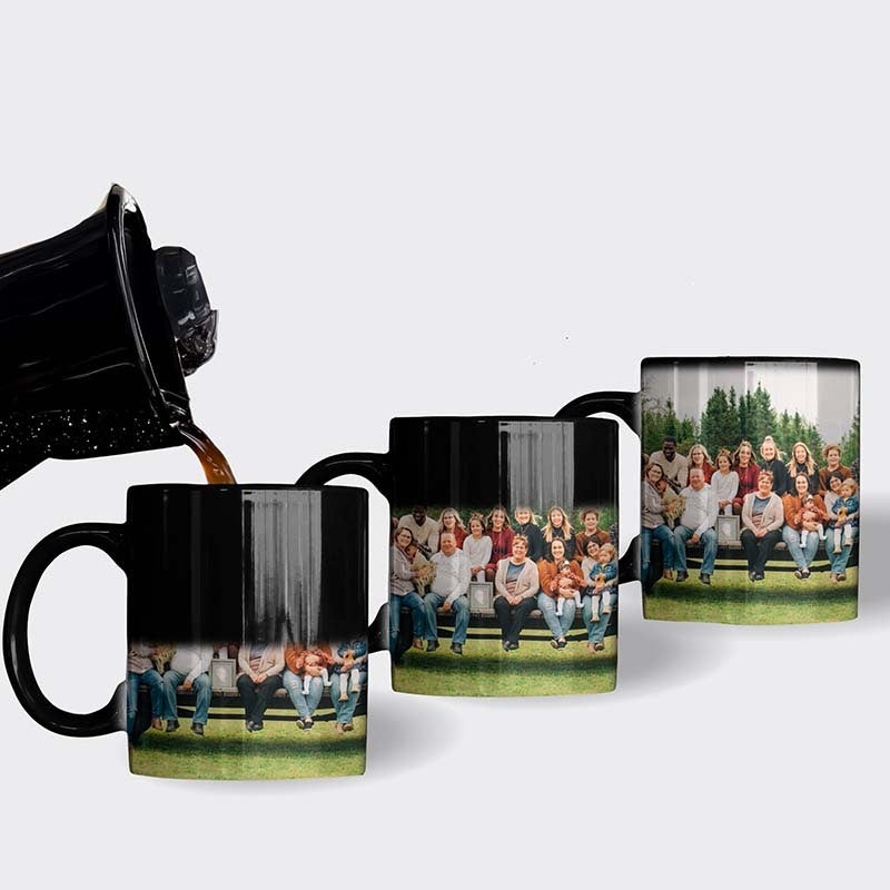 Black personalized mug revealing a large family photo as hot coffee is poured in, showing the image gradually appearing from left to right.