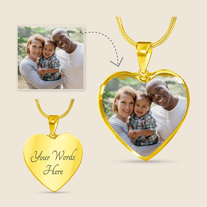 Gold heart-shaped photo pendant with a family photo and customizable text on a beige background