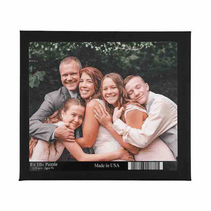 Black box for an 8x10 custom photo puzzle featuring a smiling family of five hugging outdoors.