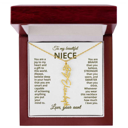 Gold necklace with iris flower design with a sentimental message card for niece in a wooden box.