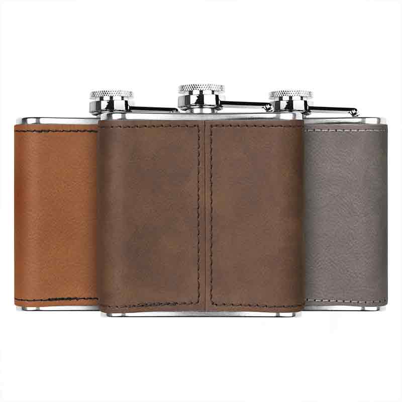 Stainless steel engraved flask in dark brown, gray, and rawhide colors, showing the back of the flasks.