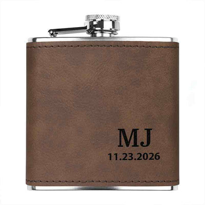 Stainless steel custom engraved flask in dark brown color, showing custom initials and date engraving.