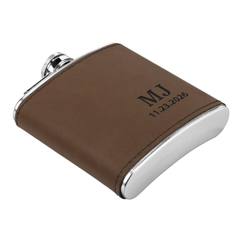 Stainless steel custom engraved flask in dark brown color, showing personalized initials and date engraving.