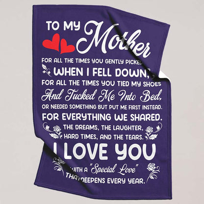 Decorative purple blanket with rose design and a heartfelt message for mother, on a beige background