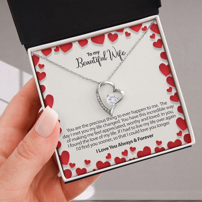 personalized wife gift: Heart-shaped necklace in a box with a sentimental message for a wife.