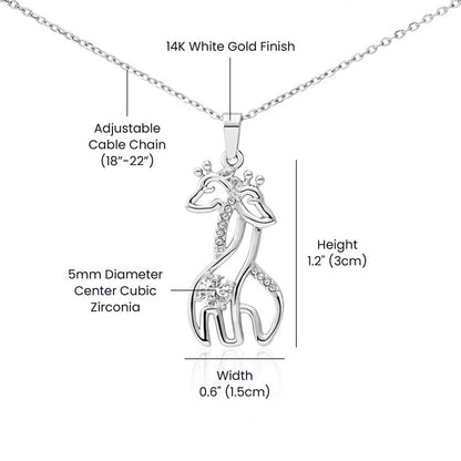 Giraffe pendant necklace on an adjustable chain, shown with labeled details including 14K white gold finish, 5mm cubic zirconia center stone, and pendant size measurements.