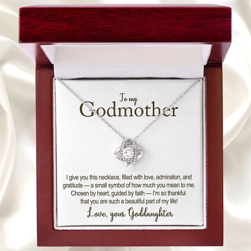 Necklace with a card for 'My Godmother' on a white background