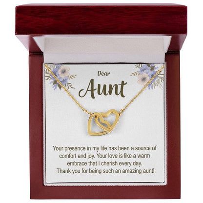 Gold necklace with interlocking hearts in a luxury gift box with a message card aunt keepsake.

