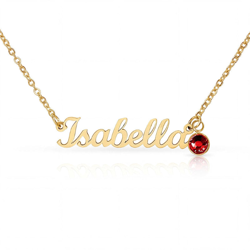 Gold necklace with 'Isabella' pendant and red gemstone on a white background