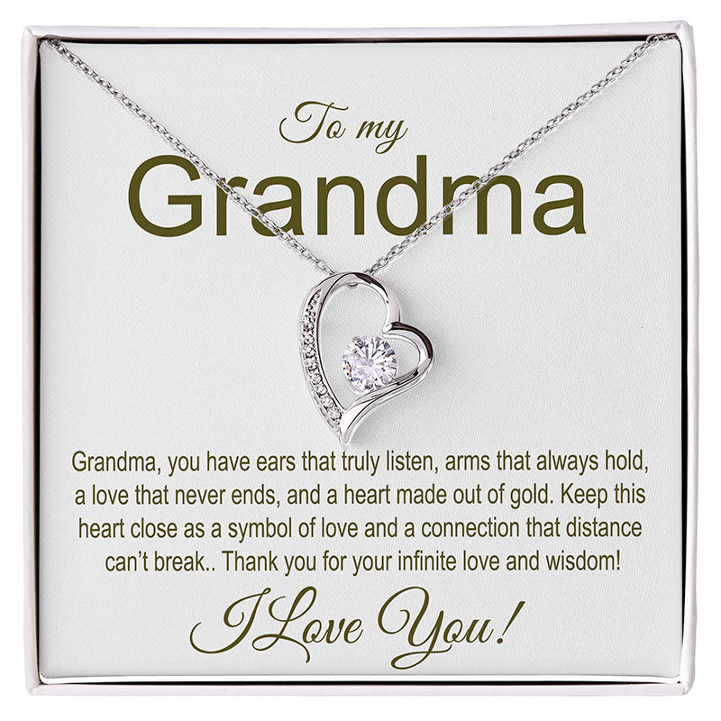 Heart-shaped necklace with a message card for grandma on a white background