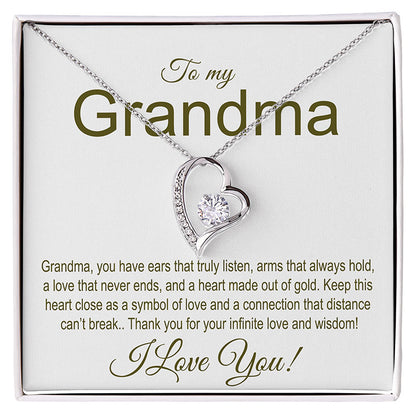 Heart-shaped necklace with a message card for grandma on a white background