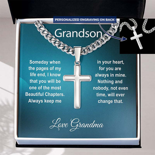 keepsake gift for grandson: Silver cross necklace with sentimental message on a blue card, displayed in a gift box on a beige background.