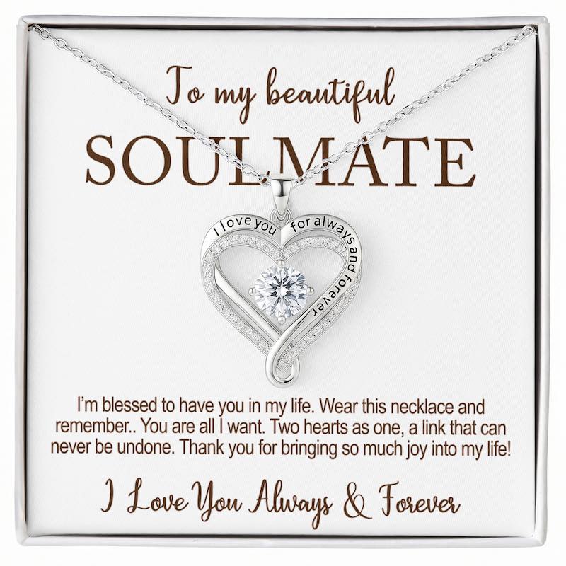 romantic gift for her: heart-shaped necklace with a message card for a soulmate on a white background