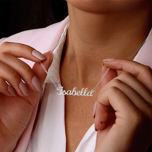 Person adjusting a silver 'Isabella' necklace on their neck