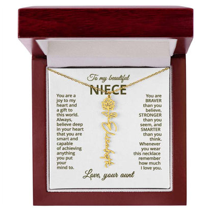 Gold name necklace and water lily pendant with a message card for a niece in a wooden box 